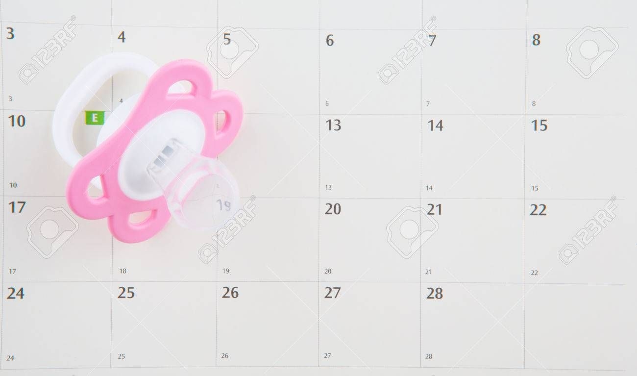Concept Image Of Baby Girl Pregnancy Delivery Due Date With Calendar..