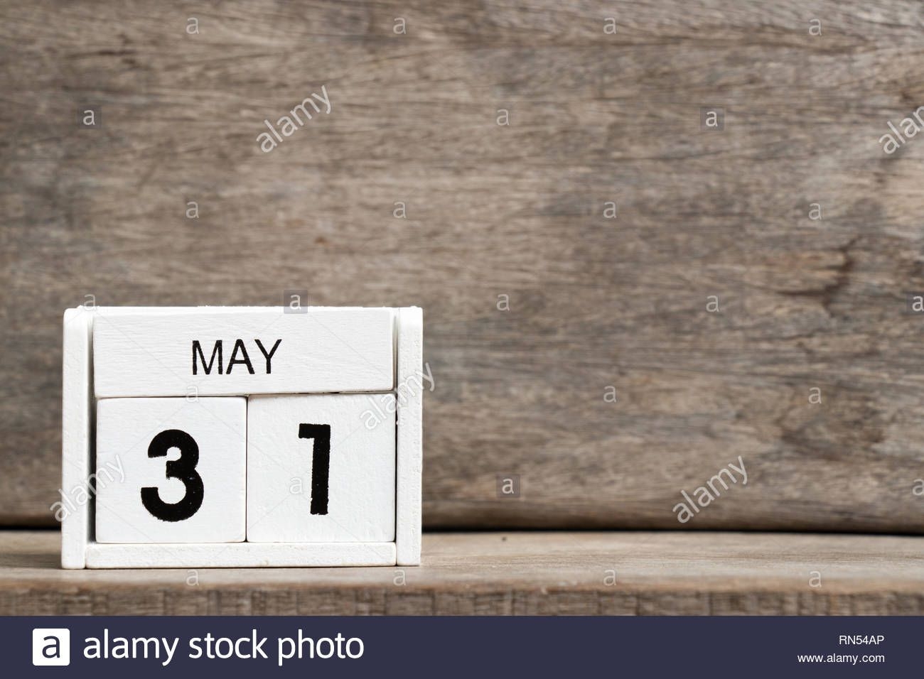 White Block Calendar Present Date 31 And Month May On Wood