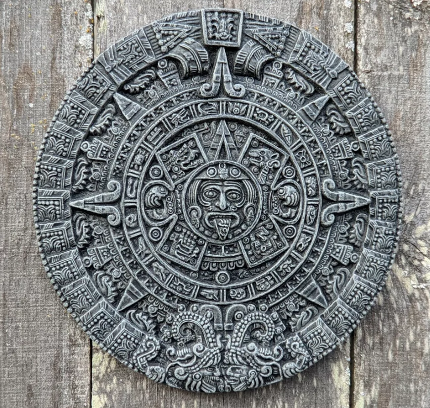 Aztec calendar stone illustration with detailed carvings